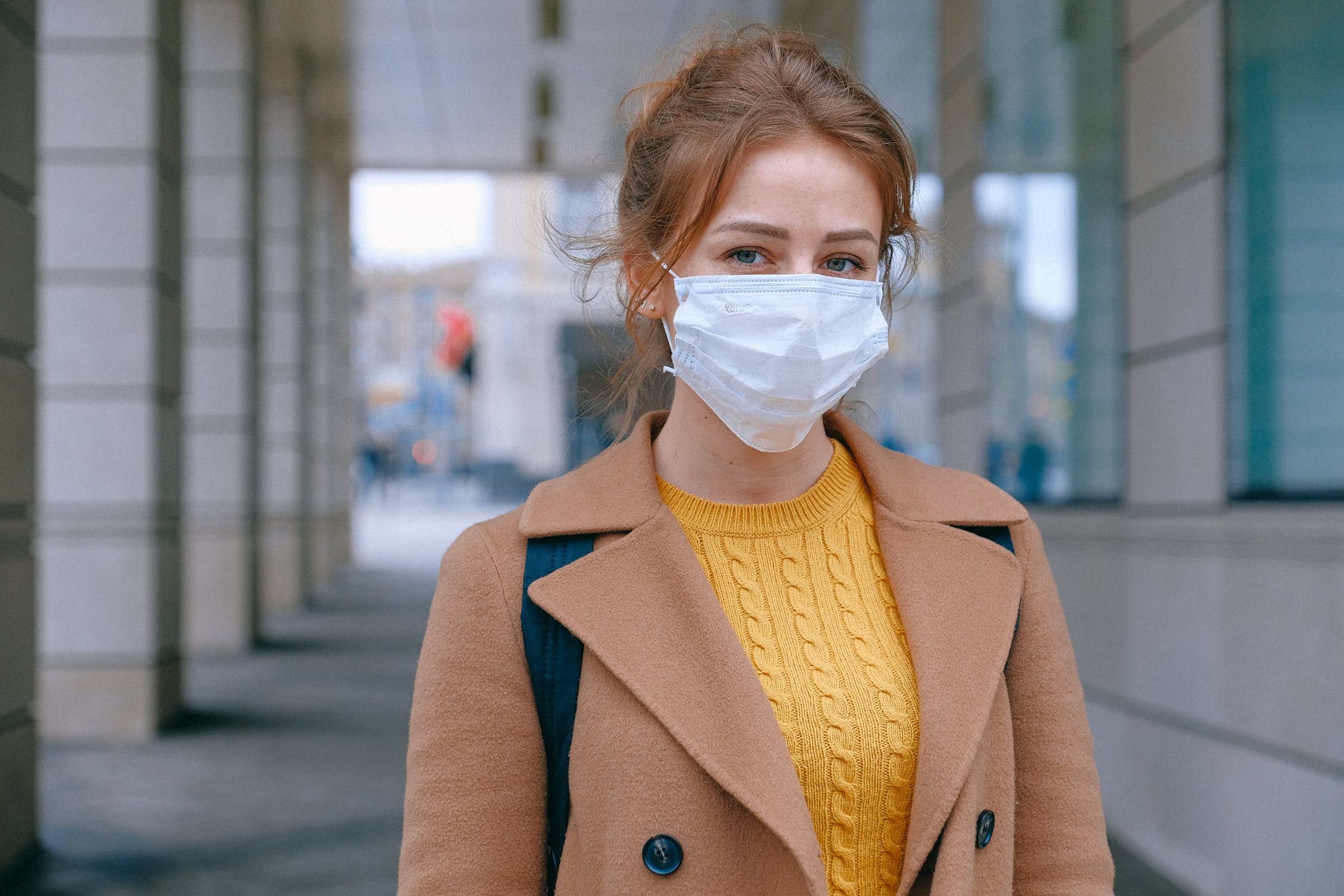photo of woman in face mask
