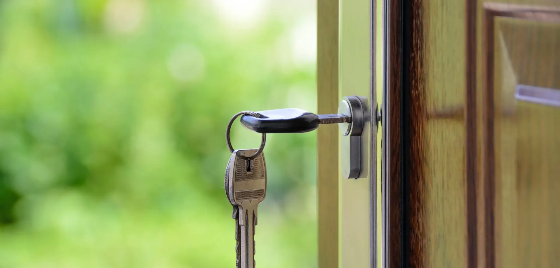 photo of key in door lock